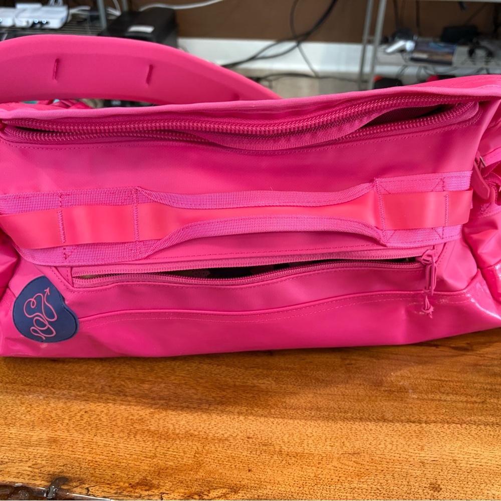 Vibrant Pink Travel Bag with Multiple Compartments